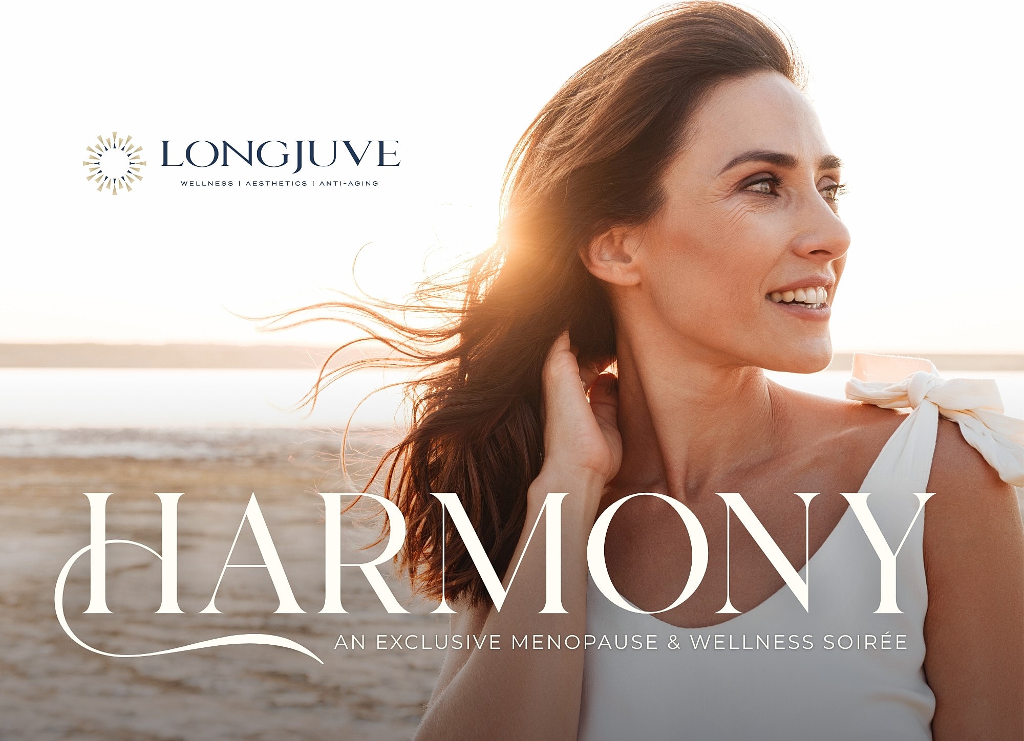 Smiling woman with wavy hair and warm expression